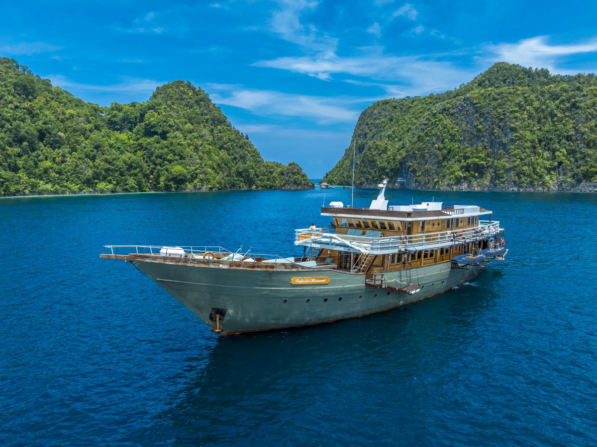 Emperor Harmoni among some islands in Raja Ampat