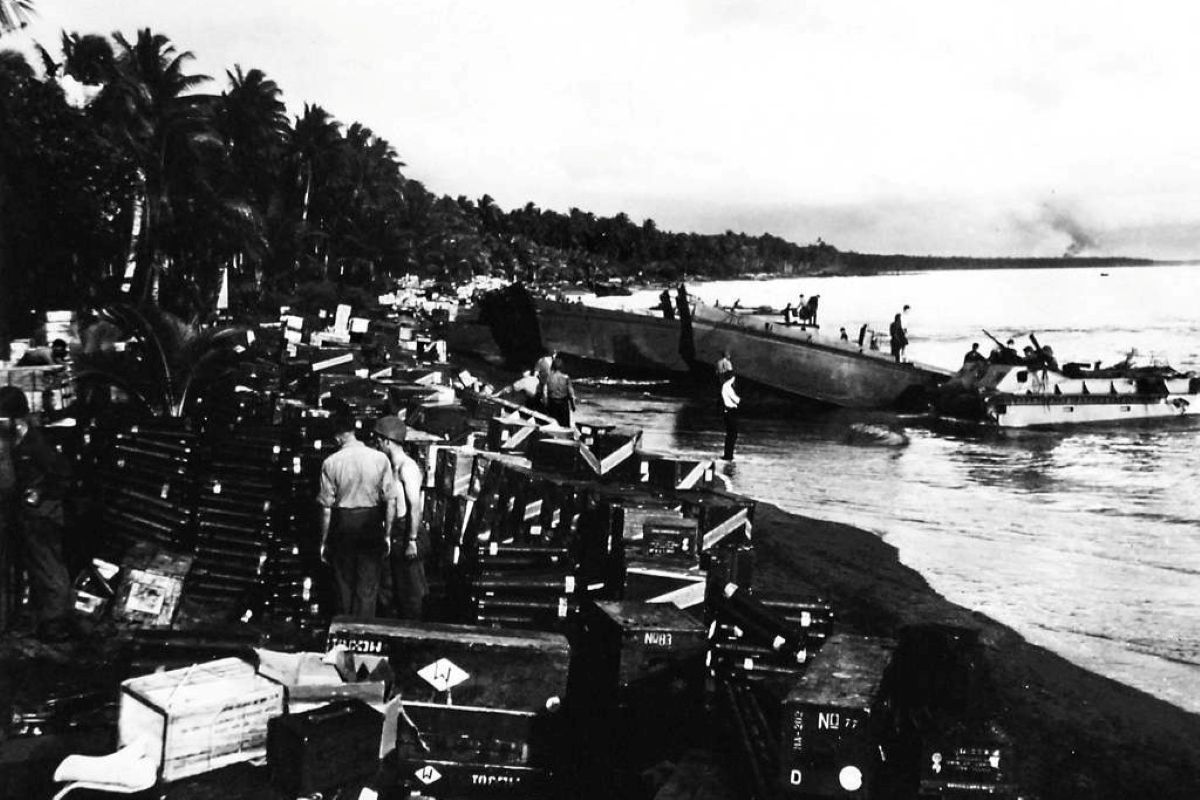 Troops unloading weapons at Guadalcanal during World War II