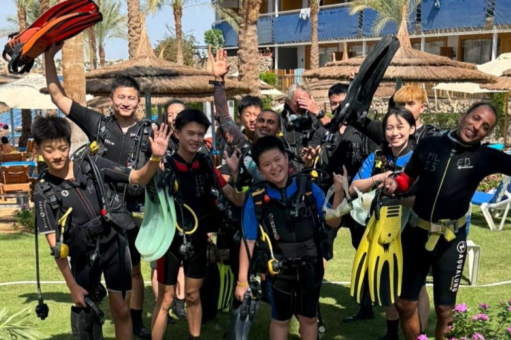 A family group look happy after the Try Dive and Discover Scuba Diving session